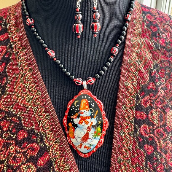 Hand-painted snowman on Russian black Lacquer made into a necklace. Seasonal Fun - Picture 1 of 12